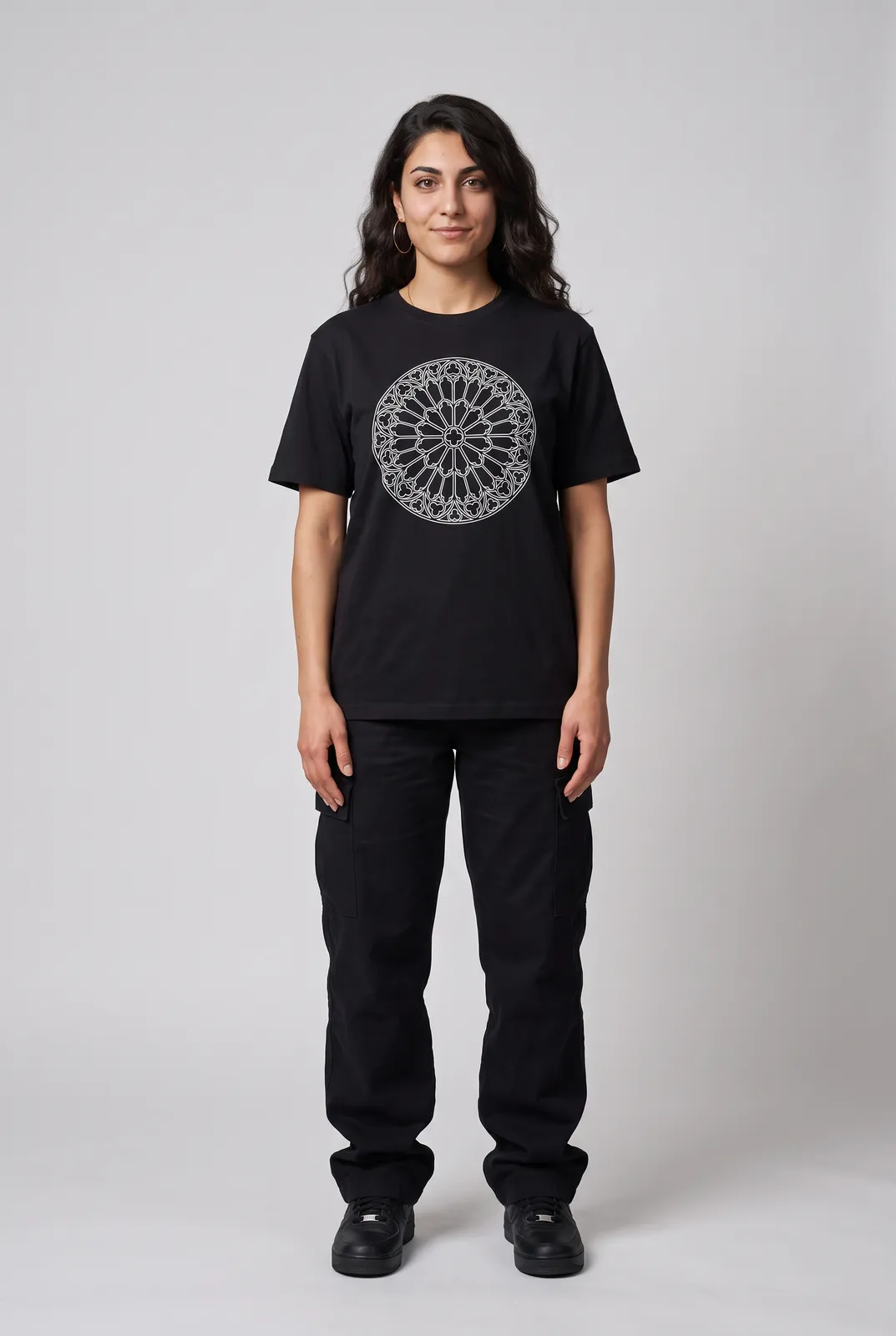 Amara Haddad wearing the CATHEDRAL Tee in Black, front hero